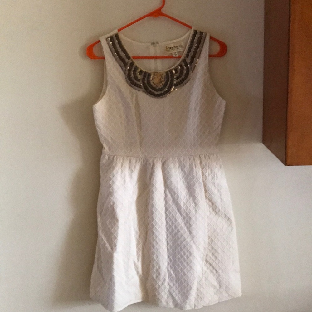 Francesca’s ivory beaded dress